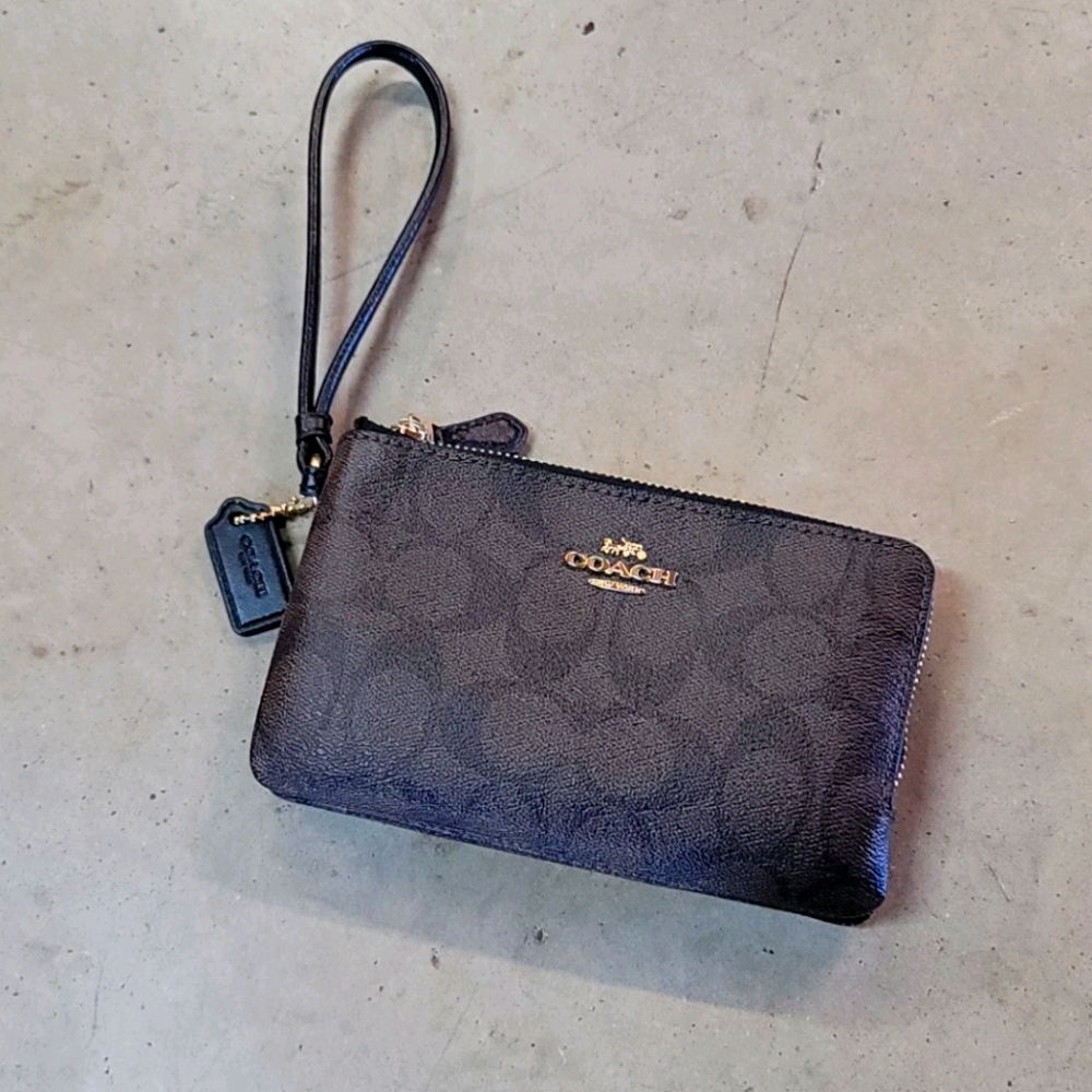 Coach wristlet brown and black signature
